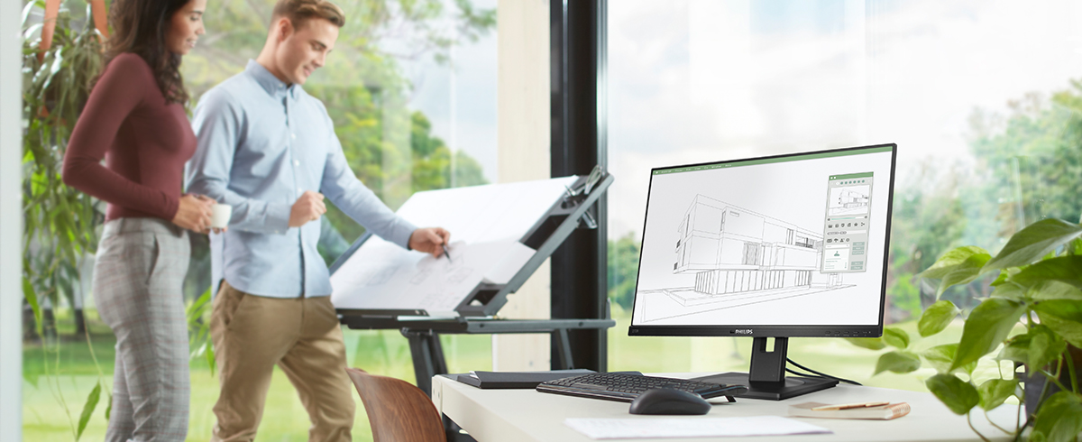 Folk nyter arbeidsplassen med Philips' gr&oslash;nne, milj&oslash;vennlige skjermer.